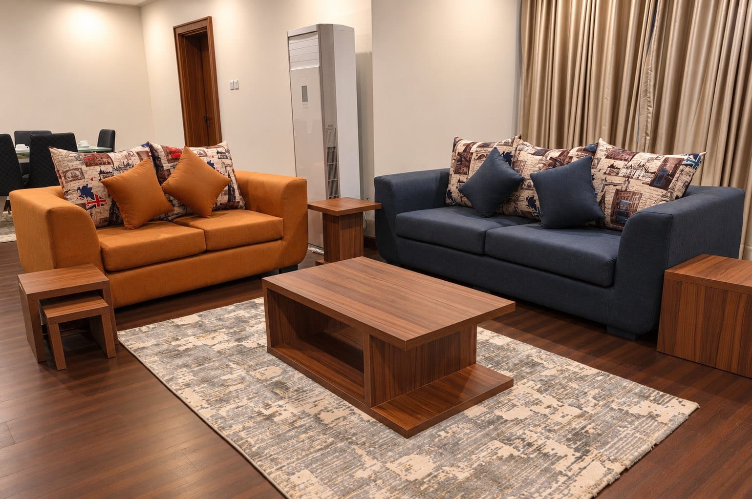 Penthouse Perfection: living room with two sofas and a statement rug